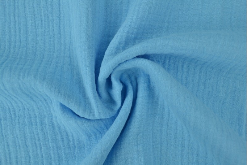 Mousseline stof - Aqua blauw Mousseline stof - Aqua blauw